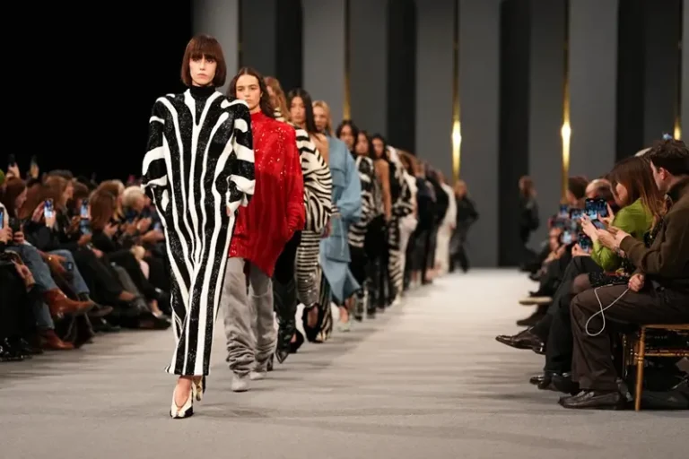 Models wear creations as part of the Balmain Fall/Winter 2025-2026 Womenswear collection presented in Paris, March 5, 2025. (Photo by Scott A Garfitt/Invision/AP, File)