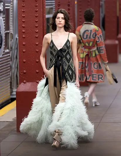 A model walks the runway during the CHANEL 2025/26 Métiers d’art fashion show at Bowery subway station, Tuesday, Dec. 2, 2025, in New York. (Photo by CJ Rivera/Invision/AP)