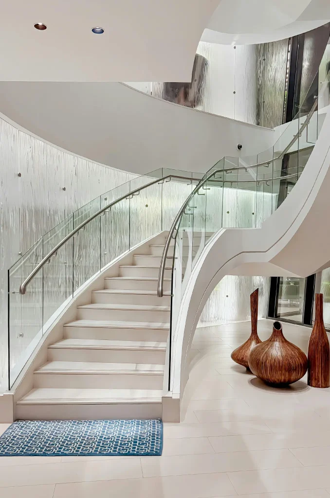 Elegant Spiral Staircase in Modern Dubai Interior. Photo by Sevi Schiegg
