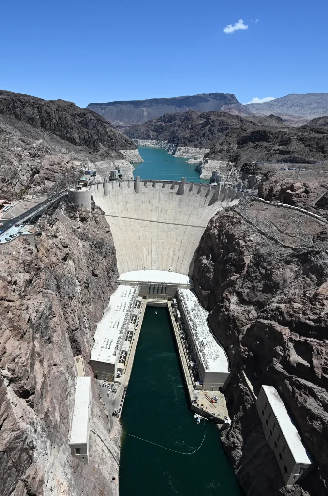An aerial view shows the "bathtub ring", a white band of mineral deposits showing previous water levels, of Lake Mead on June 28, 2022 at the Hoover Dam on the Colorado River at the Nevada and Arizona state border. (Photo by Patrick T. FALLON / AFP) (Photo by PATRICK T. FALLON/AFP via Getty Images)